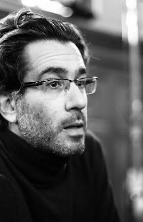 Serge Ioan Celebidachi as Director