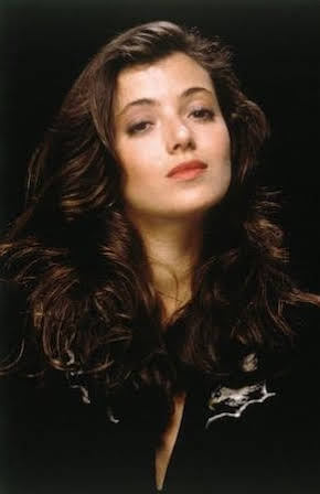 Mia Sara as 