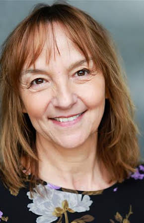 Victoria Willing as Mrs. Cartwright