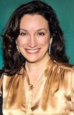 Trish Adlesic som Director