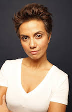 Fawzia Mirza as Director