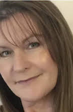 Joanne Reay as Director