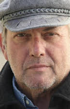 James Anthony Cotton as Director
