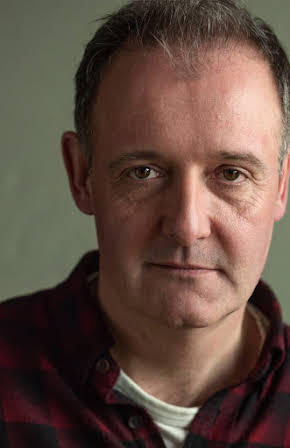 Colin Mace as 
