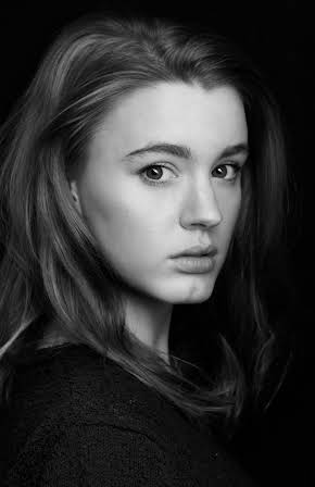 Amy James-Kelly as 