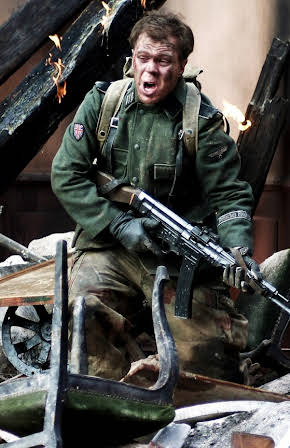 Ricci Harnett as Director