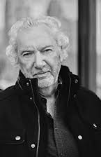 Don McCutcheon como Director