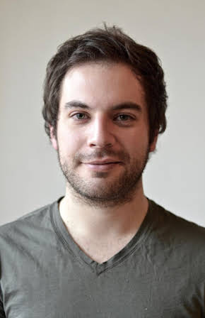 Justin Collette as 
