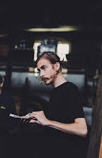 Austin Vesely as Director