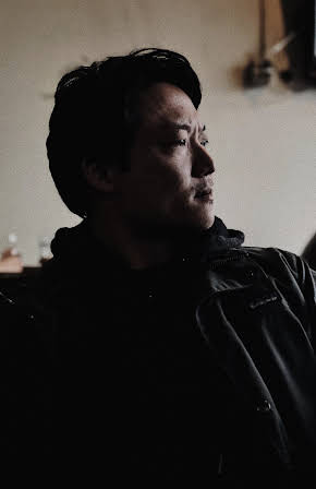 Mike Shum as Director