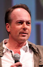 Tom McGrath som Director