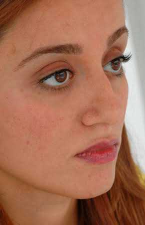 Tanaz Eshaghian as Director