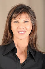 Caroline Cory as Director