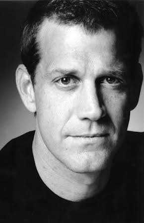Rhys Muldoon as 
