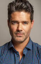 Jeremy John Wells as Director