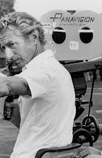 John Guillermin as 