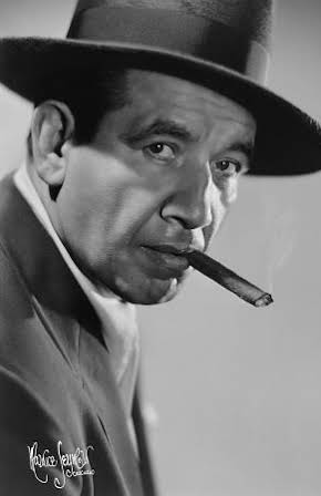 Mike Mazurki as 