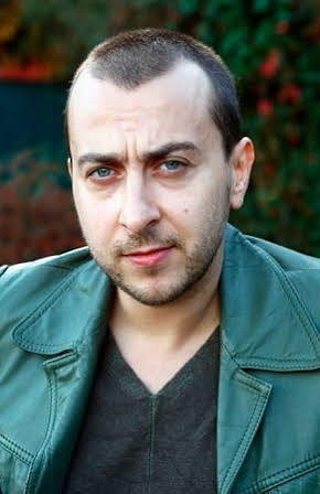 Ali Atay as Director