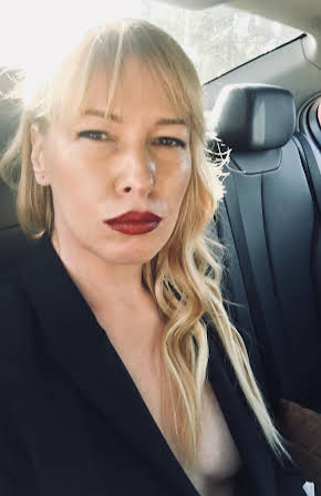 Inna Blokhina as Director