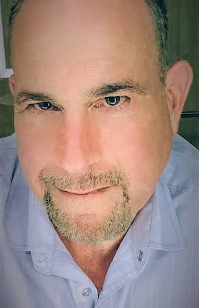 Malcolm Danare as 