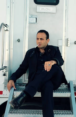 Roman Mitichyan as 
