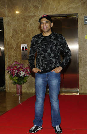 Farhad Samji as Director