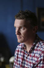 Colin Barnicle som Director