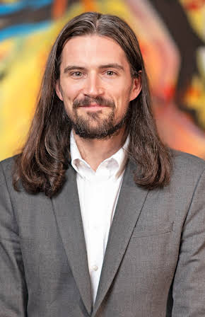 Patrick James Lynch as Director