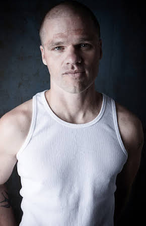 Evan Jones as 