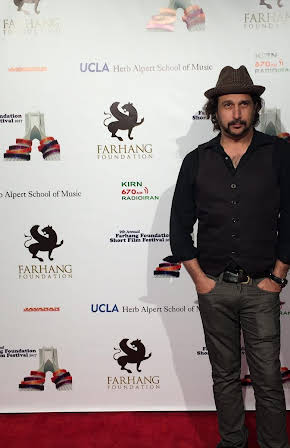 Darius A. Kamali as Director