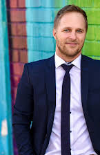 Maclain Nelson as Director