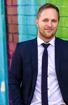 Maclain Nelson as Director