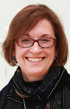 Kristi Zea som Director