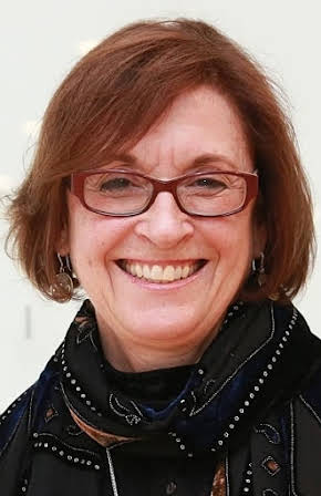 Kristi Zea as Director