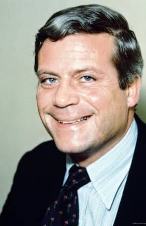 Oliver Reed as 
