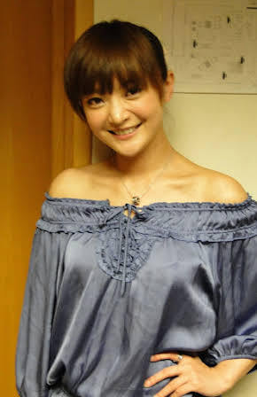 Queenie Tai as 