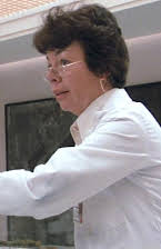 Pat Starr como Mrs. Flo Spector