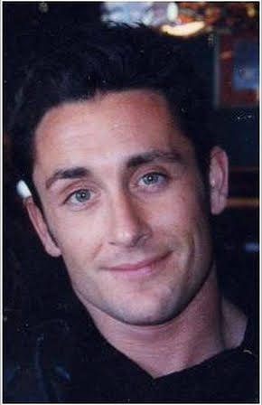 Doug Erholtz as 