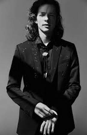 Mike Faist as 