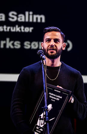 Ulaa Salim as Director