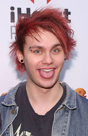 Michael Clifford as 