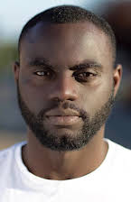 Michael Akinsulire as 