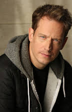 John Asher som Director