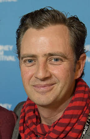 Andrew Curry as 