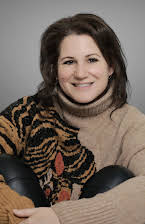 Uga Carlini as Director