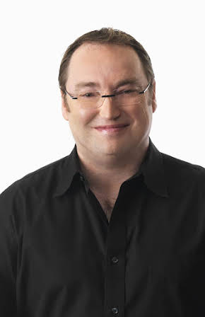 Simon J. Smith as Director