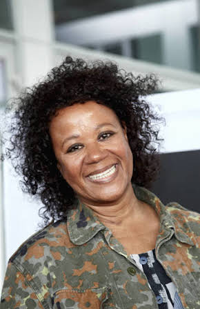 Hella Joof as Director