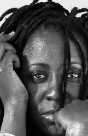 Peres Owino as Director