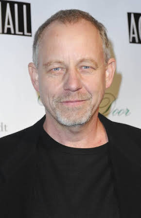Brad Greenquist as 