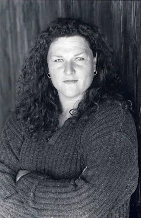 Dot Marie Jones as 
